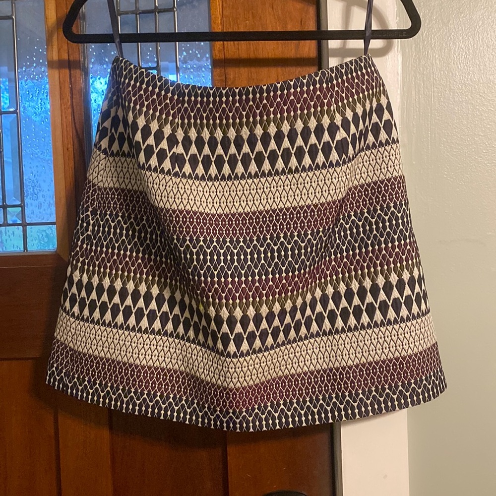 Mini skirt w/quilted details. Brand new with tags, never worn
